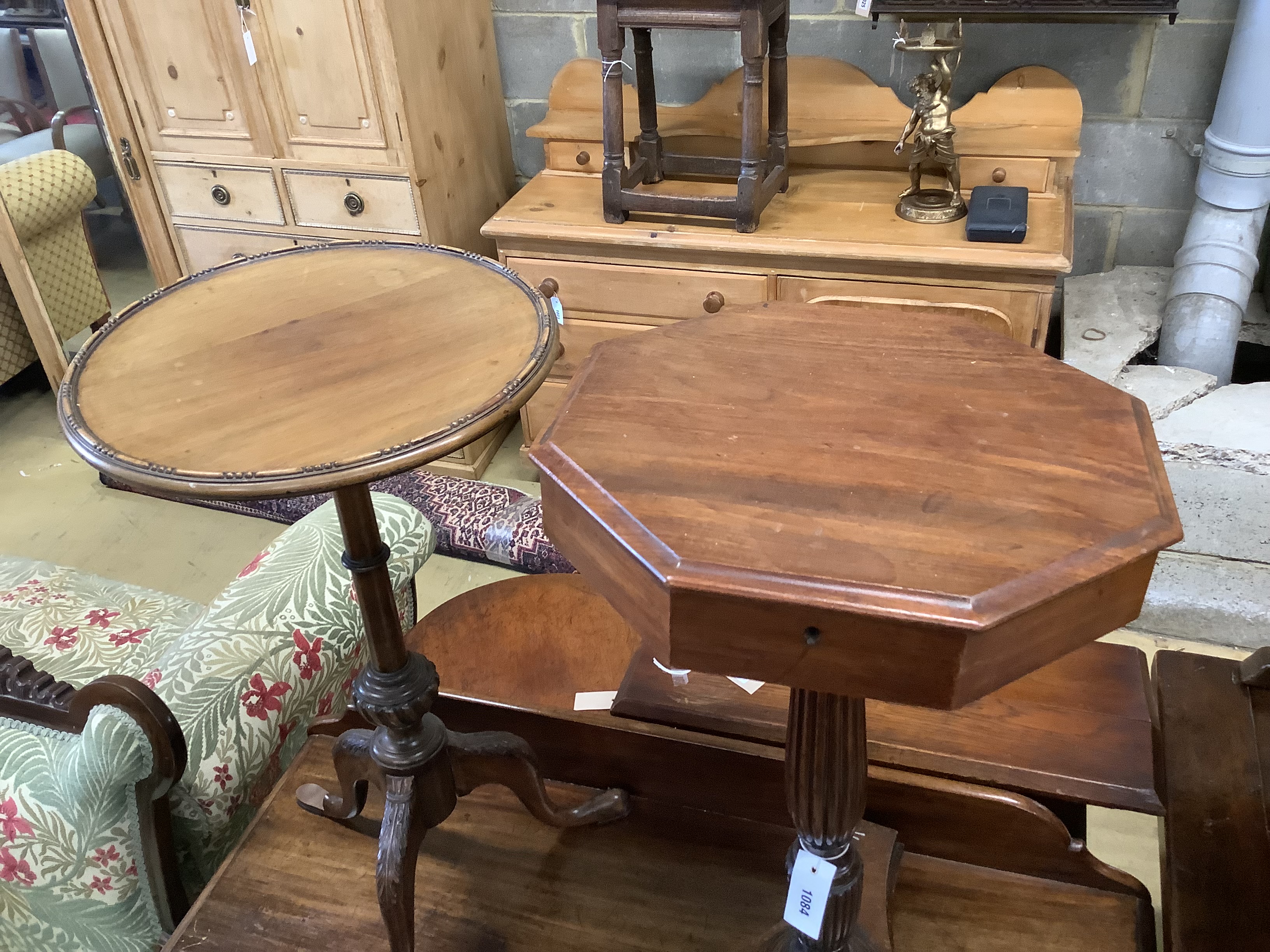 An octagonal mahogany wine / side table, width 40cm, height 74cm together with a mahogany wine table with shaped border